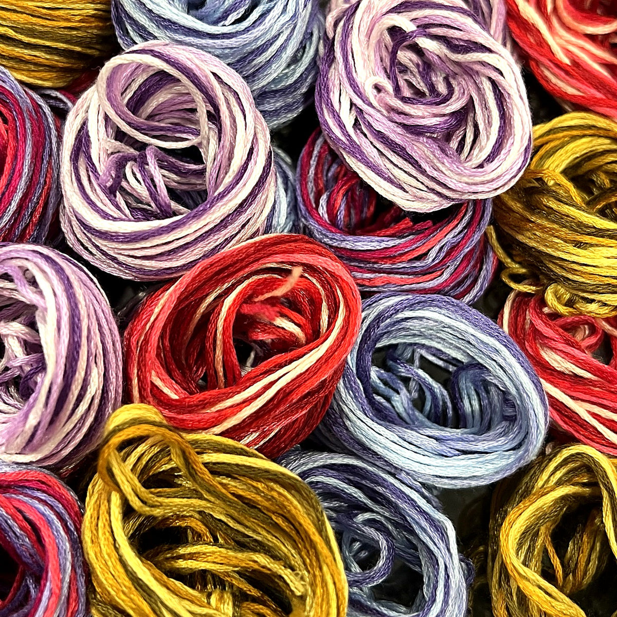 Colorful embroidery floss strings used to make Hope Bracelets 